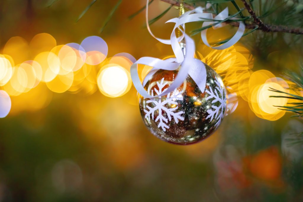 Christmas bauble hanging on a tree