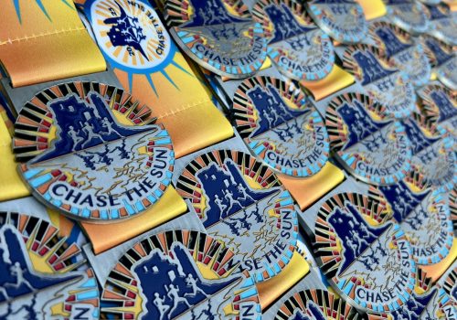 Chase the Sun run medals
